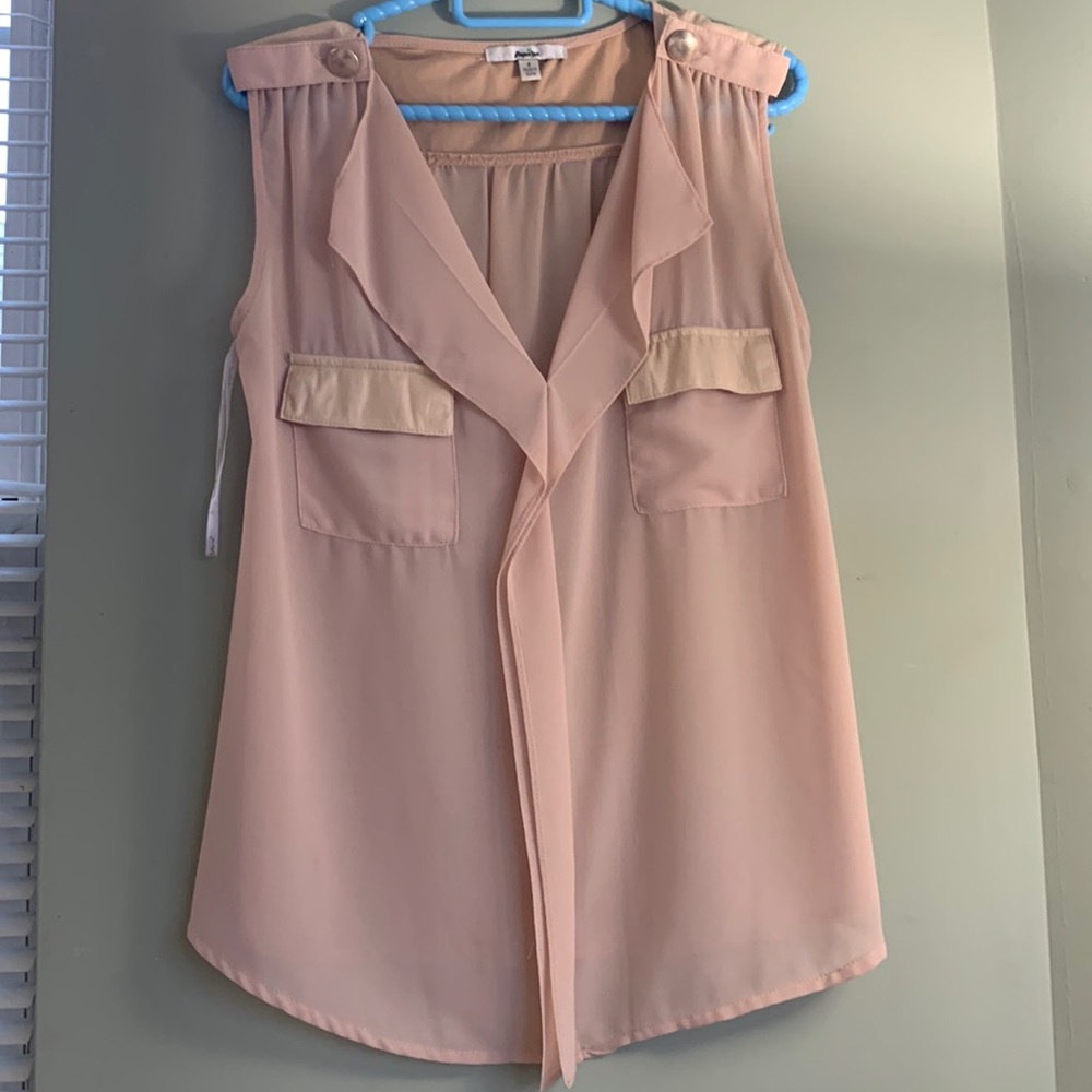 Peach sleeveless blouse